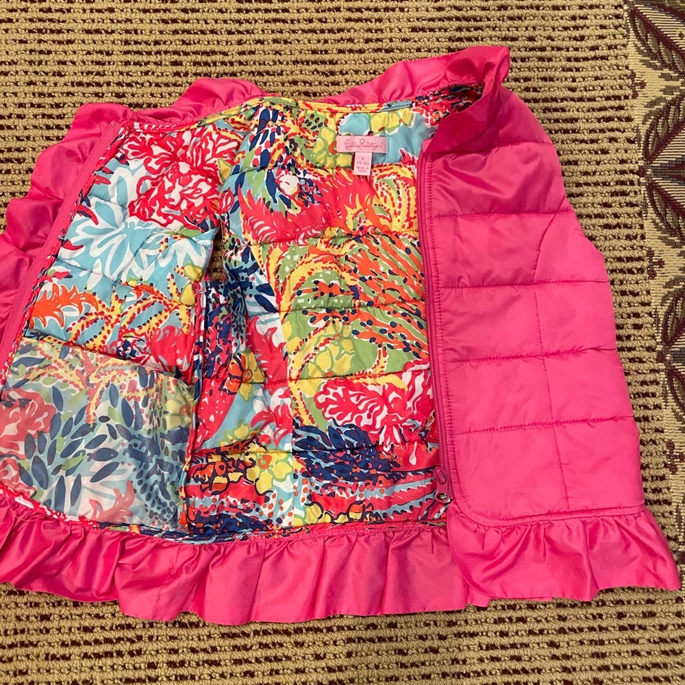 pink vest